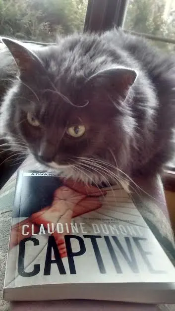 Smokey also thought this was an action-packed novel, can't you tell by her crazy eyes?