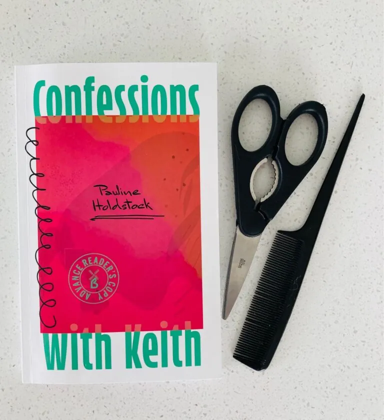 Confessions with Keith by Pauline Holdstock book next to a pair of scissors and comb