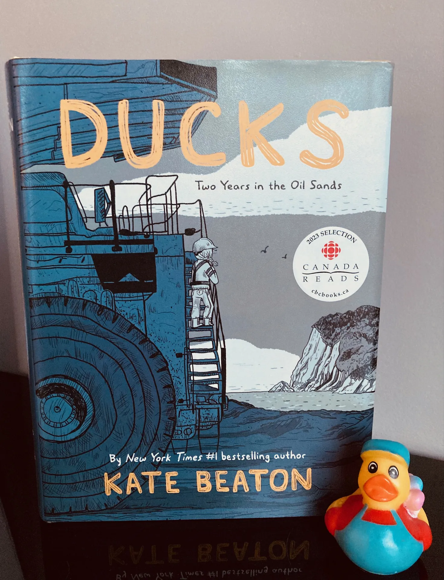 Ducks by Kate Beaton book pictured beside a small toy duck